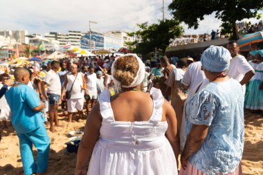 Salvador, Bahia, Brazil - February 02, 2023: Candomble members are seen paying homage to Yemanja during the Rio Vermelho beach party in Salvador, Bahia.