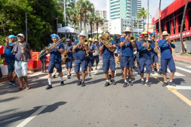 Salvador, Bahia, Brazil - February 11, 2023: Musicians from the municipal guard are seen during a performance at the pre-carnival Fuzue in the city of Salvador.