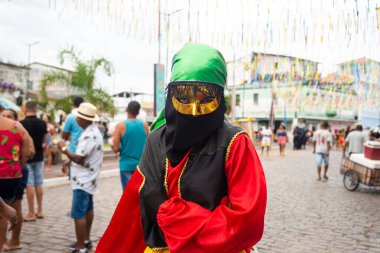 Maragogipe, Bahia, Brazil - February 20, 2023: Woman dressed as a gypsy parades in the streets during the Maragogipe Carnival in Bahia.