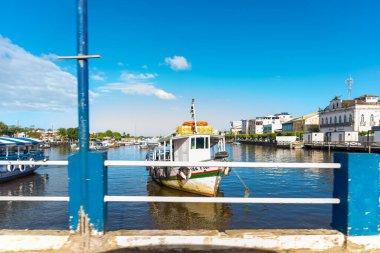 Valenca, Bahia, Brazil - September 09, 2022: Fishing and sightseeing boats docked on the Una river in Valenca, Bahia.