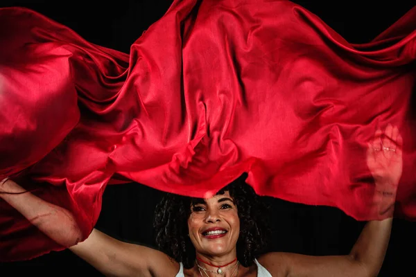 Portrait Woman Manipulating Red Cloth Isolated Black Background —  Fotos de Stock