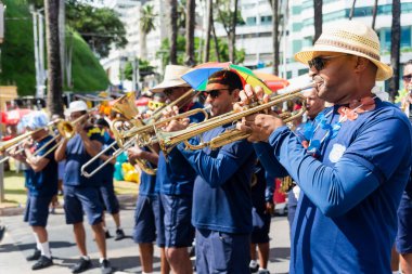 Salvador, Bahia, Brazil - February 11, 2023: Musicians from the municipal guard are seen during a performance at the pre-carnival Fuzue in the city of Salvador.