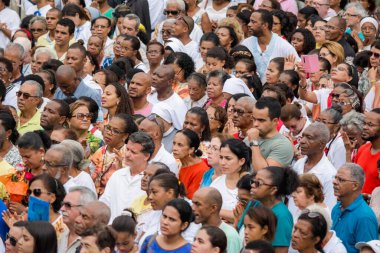 Salvador, Bahia, Brazil - May 26, 2016: Many Catholics are following the outdoor Mass in honor of Corpus Christi in Salvador, Bahia.