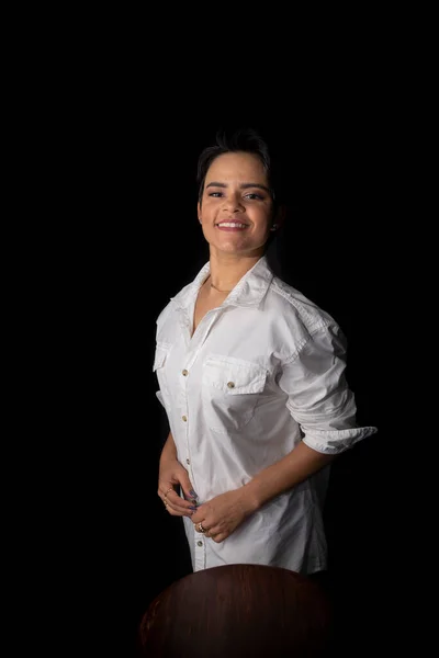 Young Beautiful Woman Wearing White Shirt Barstool Isolated Black Background — Fotografia de Stock