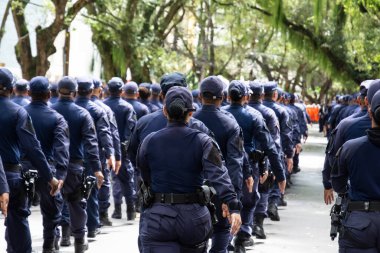 Salvador, Bahia, Brazil - September 07, 2022: Municipal guards parade during tributes to the Brazilian Independence Day in Salvador, Bahia. clipart