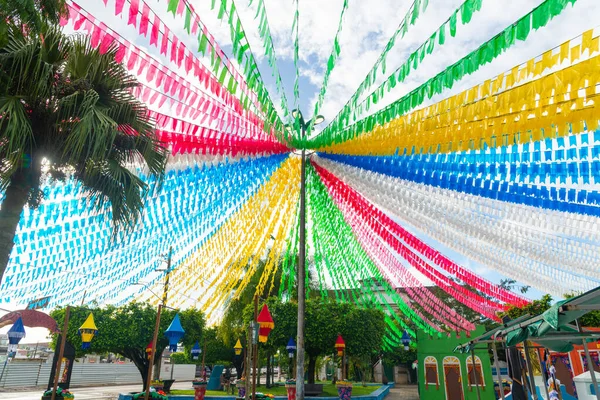 stock image Valenca, Bahia, Brazil - June 24, 2022: Square decorated with balloons and colorful flags for the Festa Junina de Sao Joao in the city of Valenca, Bahia.