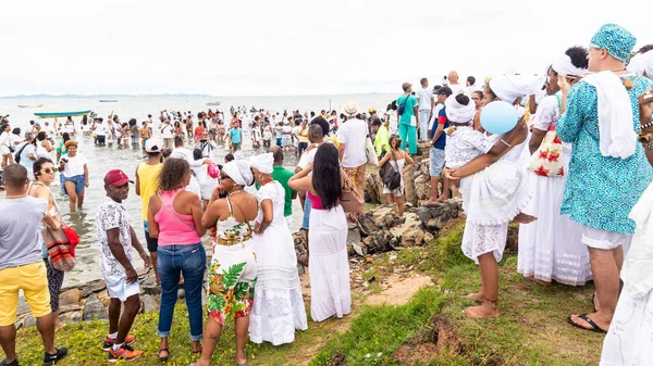 stock image Santo Amaro, Bahia, Brazil - May 15, 2022: Hundreds of Candomble members are seen on Itapema beach during the Bembe do Mercado celebrations in the city of Santo Amaro.