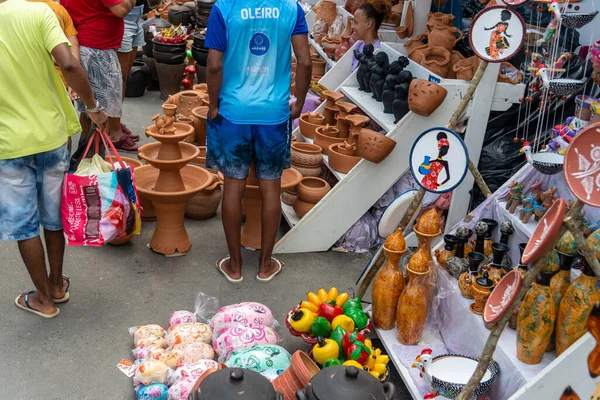 stock image Nazare, Bahia, Brazil - April 08, 2023: People visiting and buying pieces at the traditional Caxixis fair in Nazare, Bahia.