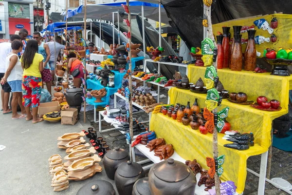 stock image Nazare, Bahia, Brazil - April 08, 2023: People visiting and buying pieces at the traditional Caxixis fair in Nazare, Bahia.