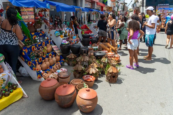 stock image Nazare, Bahia, Brazil - April 08, 2023: People visiting and buying pieces at the traditional Caxixis fair in Nazare, Bahia.