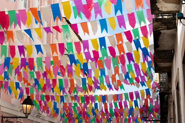 stock image Salvador, Bahia, Brazil - June 15, 2023: Many colorful flags decorating the houses and streets of Pelourinho for the Sao Joao festival in June in Salvador, Bahia.