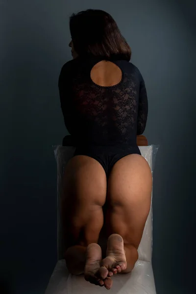 Sensual Brunette Her Knees Chair Her Back Showing Her Ass — стоковое фото
