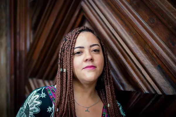 Portrait Beautiful Woman Face Braids Her Hair Old Wooden Door — Stock Photo, Image