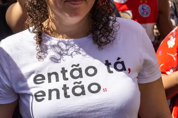 stock image Salvador, Bahia, Brazil - May 30, 2019: Brazilians protest against cuts to education by President Jair Bolsonaro wearing shirts with the names of colleges in the city of Salvador, Bahia.
