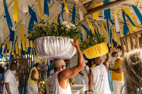 stock image Salvador, Bahia, Brazil - January 30, 2022: fishermen and members of candomble are seen carrying gifts for iemanja in the city of salvador, bahia.