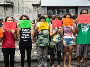 Salvador, Bahia, Brazil - May 15, 2019: Public school students are seen protesting during a demonstration in favor of Brazilian education in the city of Salvador, Bahia. clipart