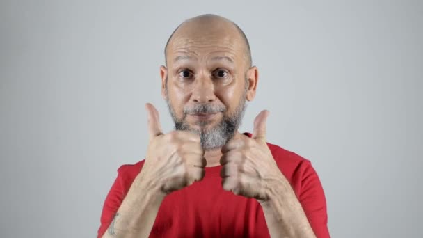 Man Red Shirt Bald Bearded Happy Making Cool Gesture Both — Stock Video