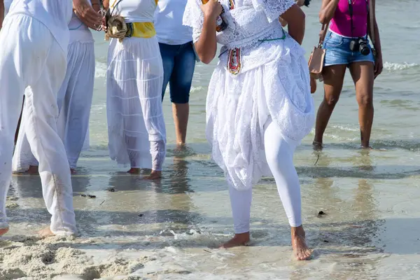 stock image Santo Amaro, Bahia, Brazil - May 19, 2019: Umbanda supporters are seen dancing during a tribute to iemanja on Itapema beach in the city of Santo Amaro, Bahia.