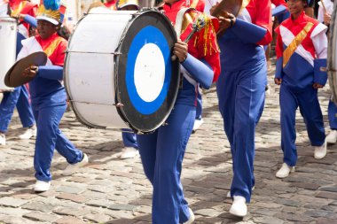 Salvador, Bahia, Brazil - July 02, 2024: Public school students are seen performing during the Dois de Julho celebration in Pelourinho, in the city of Salvador, Bahia. clipart