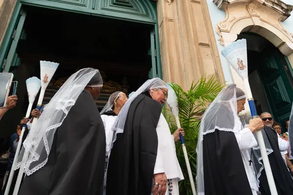 stock image Salvador, Bahia, Brazil - July 02, 2024: Several members of the black brotherhood are seen during mass at the Rosario dos Pretos church. Pelourinho, city of Salvador, Bahia.