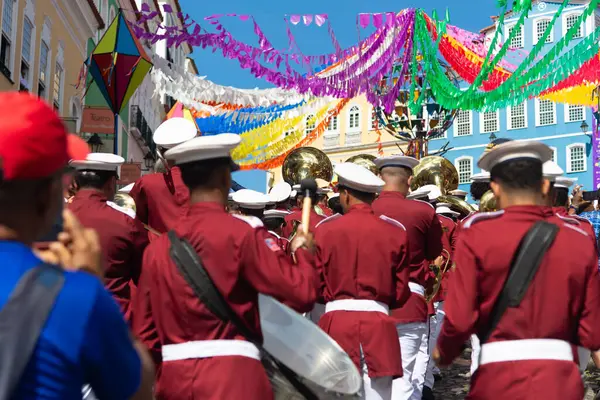 stock image Salvador, Bahia, Brazil - June 02, 2024: Group of musicians are seen playing musical instruments during the independence celebration in Bahia. City of Salvador.