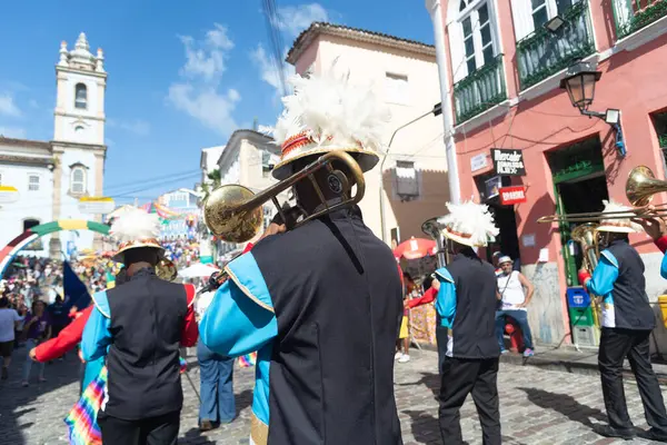 stock image Salvador, Bahia, Brazil - July 02, 2024: Public school students are seen playing wind instruments during the Bahia Independence Day parade in Pelourinho, city of Salvador.