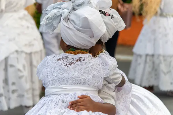 stock image Salvador, Bahia, Brazil - August 16, 2019: Candomble followers are seen paying homage during the day of Sao Roque. City of Salvador, Bahia.