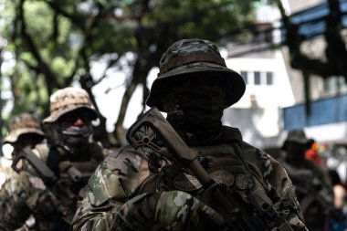 Salvador, Bahia, Brazil - September 07, 2024: Military police officers from the special forces are seen parading during Brazilian Independence Day. Salvador, Bahia. clipart