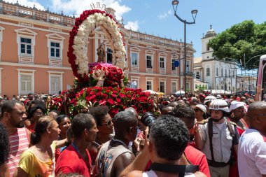 Salvador, Bahia, Brazil - December 04, 2019: Catholic faithful are seen following the procession of Saint Barbara in Pelourinho, city of Salvador, Bahia clipart