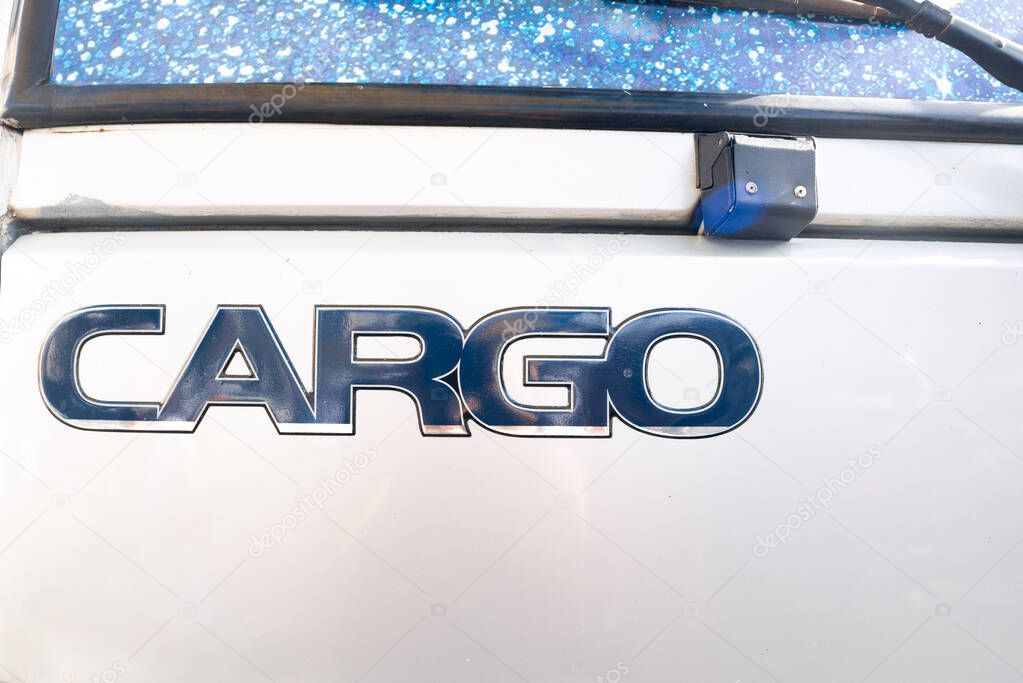 Salvador, Bahia, Brasil - 07 de junho de 2025: Cargo logo on the door of a Ford truck. City of Salvador, Brazil.