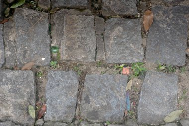 Kare ve dikdörtgen taşlı bir kaldırım dokusu. Geometrik desen. Geçmişi. Soyut. Uzayı kopyala Taşlar