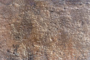 Bir duvarın hafif dokusu. Tahıllı ve pürüzlü. Projeler için arka plan. Soyut