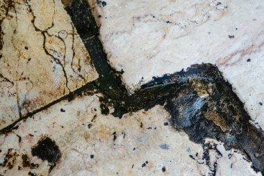 Sarı mermer zemin. Granit. Islak yağmur dokusu. Projeler için arka plan. Soyut