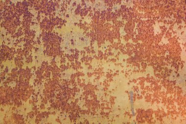 Güzel, eski paslı arka plan Çelik güneşe ve yağmura maruz kalır ve paslanmasına neden olur.