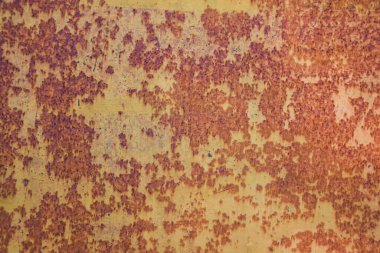 Güzel, eski paslı arka plan Çelik güneşe ve yağmura maruz kalır ve paslanmasına neden olur.