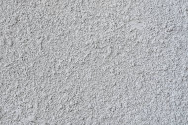 Tasarım için beyaz çimento duvar arkaplanı ve metin için boşluk