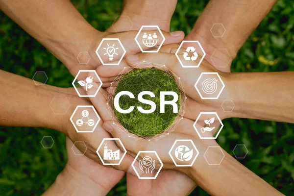 İş ve örgüt için CSR (kurumsal sosyal ve sorumluluk) simgesi kavramı. Topluma yeşil bir arka planda geri verme kavramı.