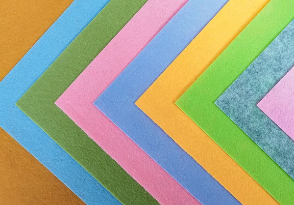 Pastel arkaplan, renkli kumaş yığını. Tam kare sessiz renkli kumaş arkaplan görüntüsü.