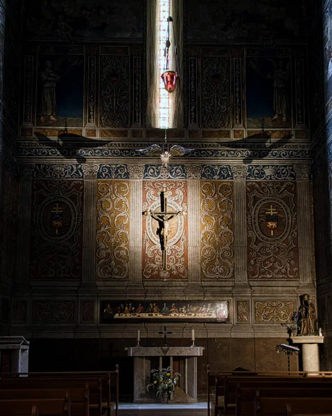 stock image An altar with crucifix illuminated by a beam of light inside Albi Cathedral in France