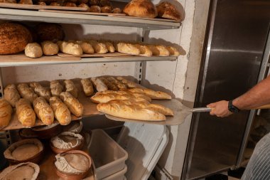 rack with freshly baked bread in a small bakery
