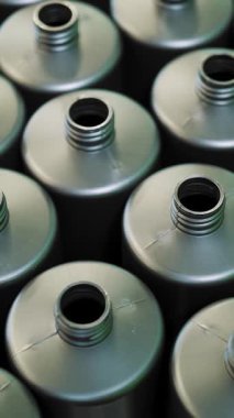 Empty plastic containers, tubes. Plastic tubes are filled with hair dye and sealed with special automatic equipment in a chemical factory.