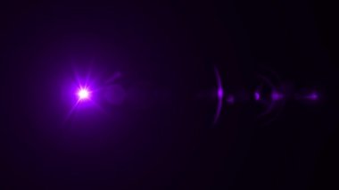 Purple flare lens effect. 4K resolution. Very high quality and realistic.on black background