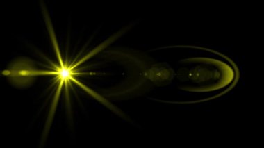 Yellow optical lens flare effect. 4K resolution. Very high quality and realistic.on black background