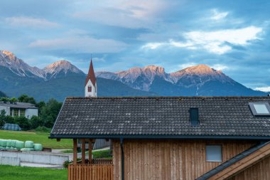 Summer scene of rural landscape in the mountains of Italy. Colorful bright panorama of the Gardena Valley. Morning in the Dolomites, South Tyrol.
