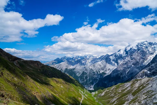 stock image View from the Stelvio Pass, the highest automobile pass in Italy, located between Trentino-Alto Adige and Lombardy, Italy. Ecologia and photo tourism concept.