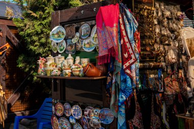 Typical souvenir shop selling souvenirs and handicrafts of Saint Petersburg at the famous street. c and crafts of local residents. clipart