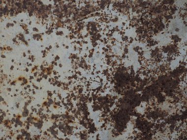 Metal bir yüzeyde paslı demir arkaplan ve doku