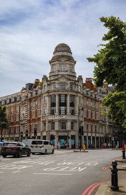 London - 06 16 2022: View of Empire House at the junction of Brompton Rd and Thurloe Pl clipart