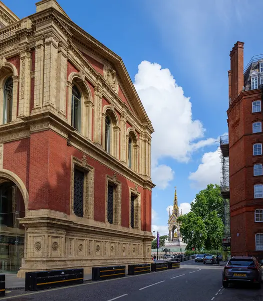 London - 06 25 2022: View of the side face of the Royal Albert Hall and the Albert Memorial in the background