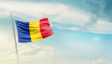Romania waving flag in beautiful sky.
